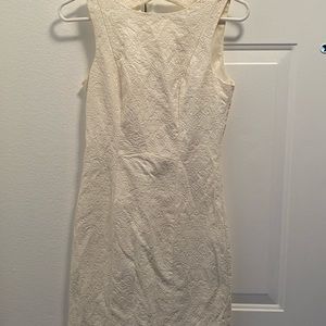 White, form fitting, sleeveless dress